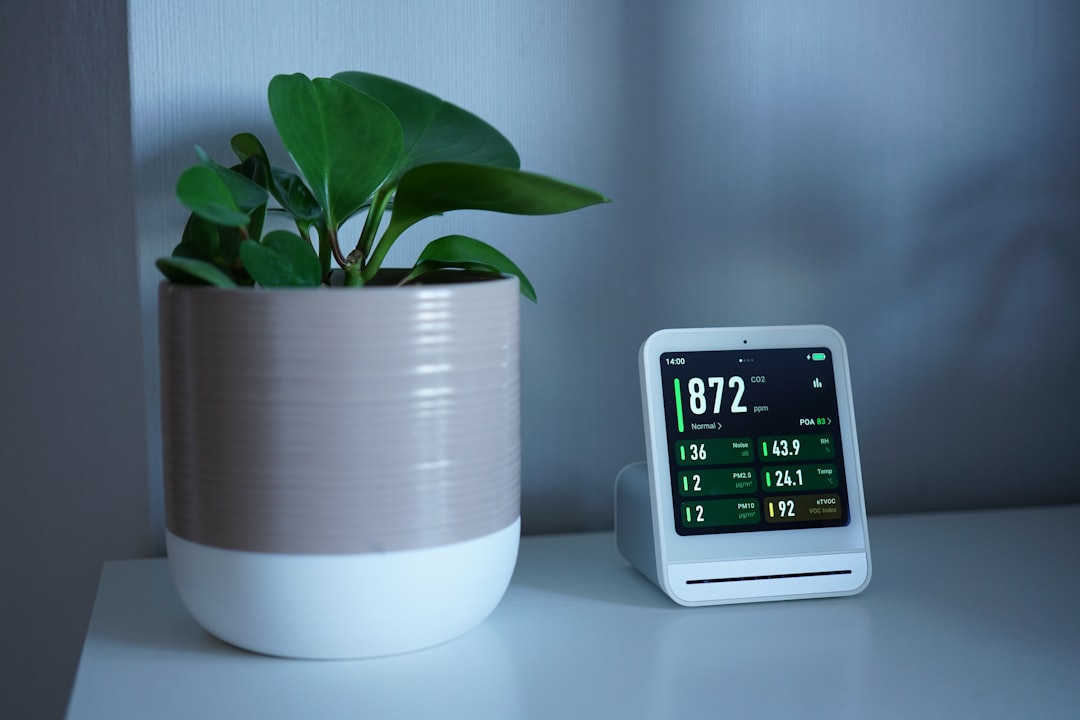 plant-next-to-a-device-displaying-readings-nh4rjjtdank